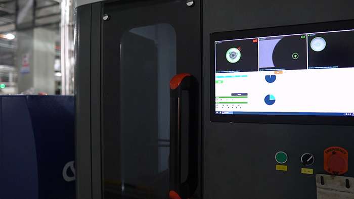 Spray film roundness inspection machine on automated production line for spray pump quality assurance and performance testing